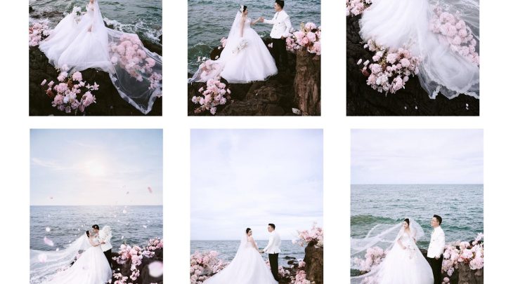 Cặp đôi trong bộ ảnh cưới ngoại cảnh tại biển với váy cưới trắng tinh khôi và vest trắng sang trọng, mang phong cách Hàn Quốc nhẹ nhàng, tông màu sáng trong trẻo.